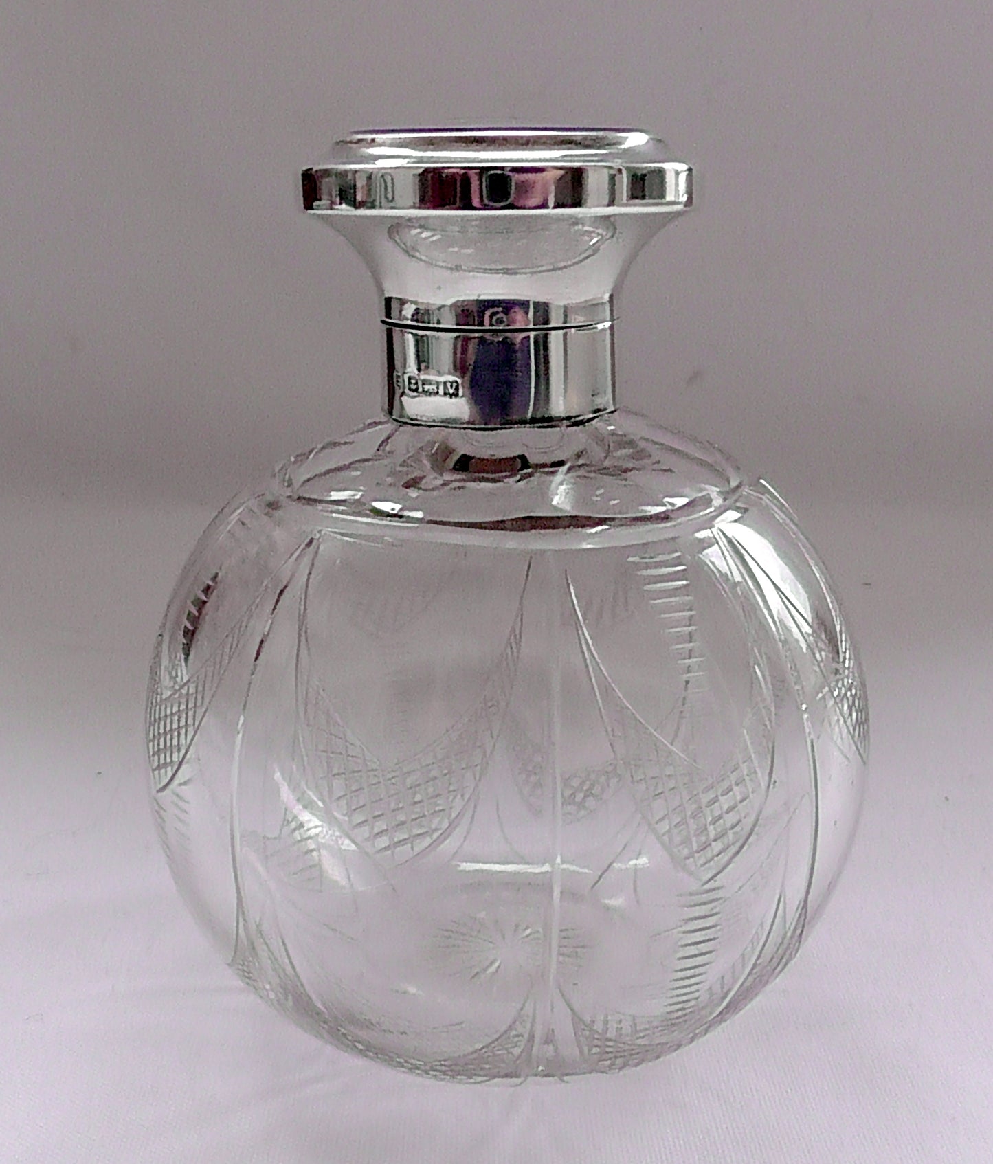 Solid Silver and Enamelled Topped Cut Glass Scent Bottle dates 1920