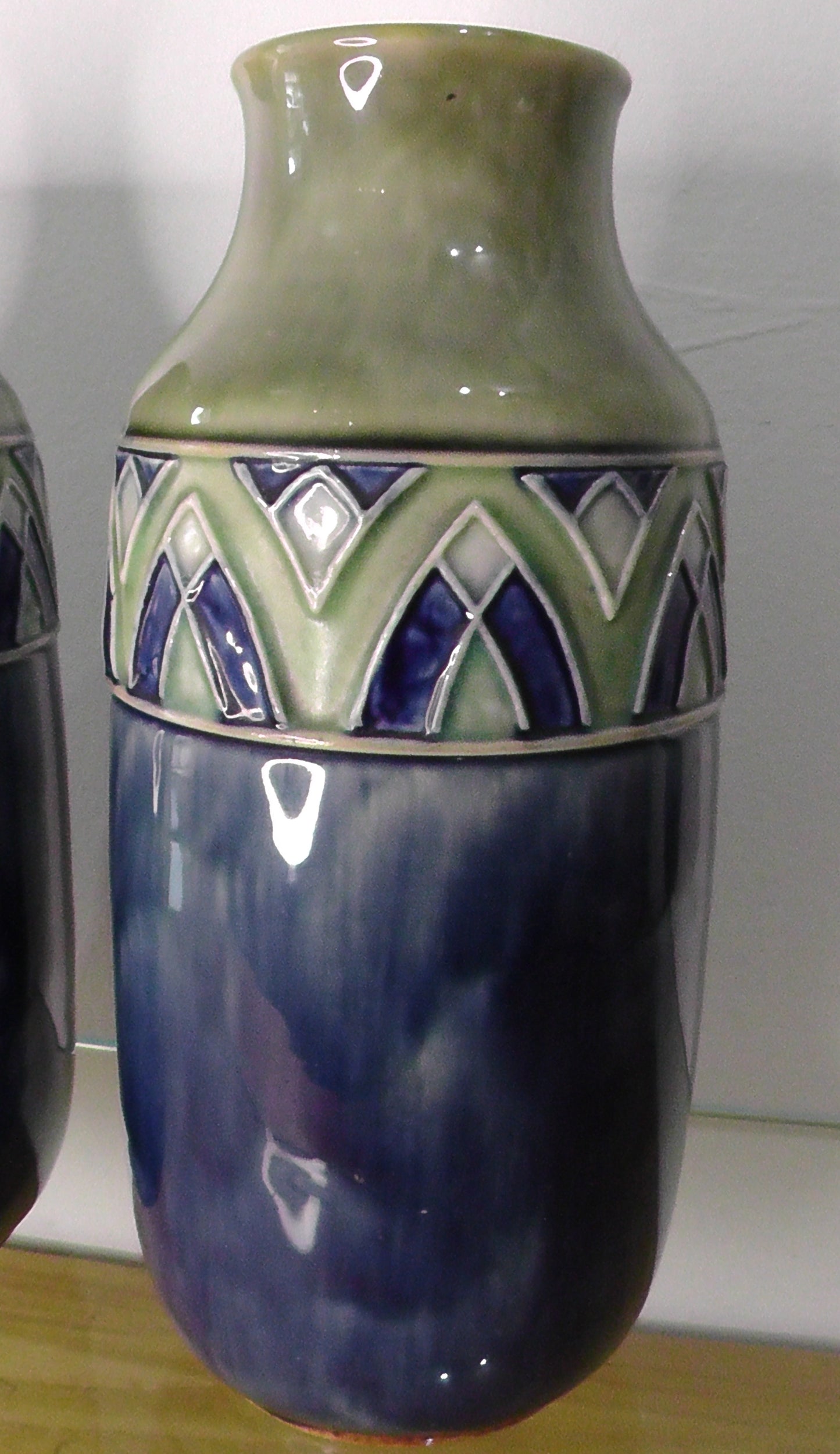 Pair of Tall Doulton Vases by Florrie Jones