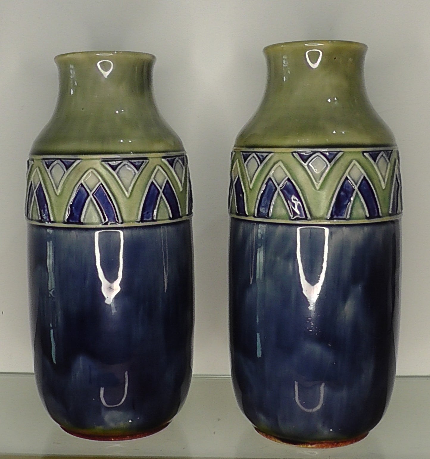 Pair of Tall Doulton Vases by Florrie Jones