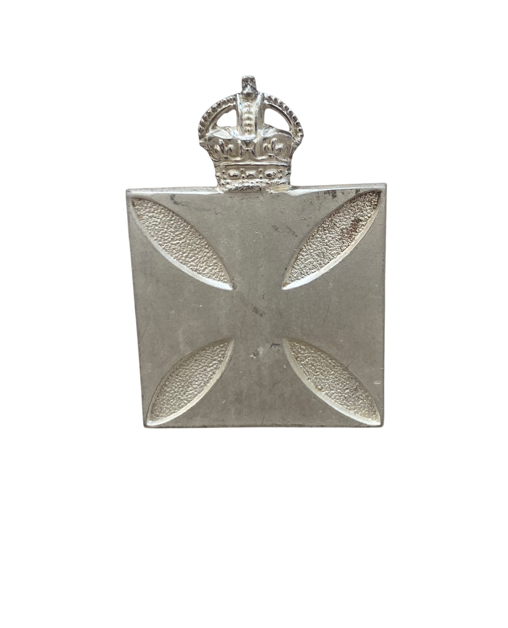 Silver badge with a cross design and crown on a white background