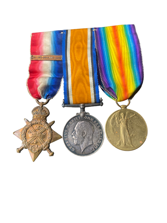 WW1 Medal Trio (Pip, Squeak & Wilfred) w/ Mons Clasp to Pte D. H. W. Lawrence - South Staffs