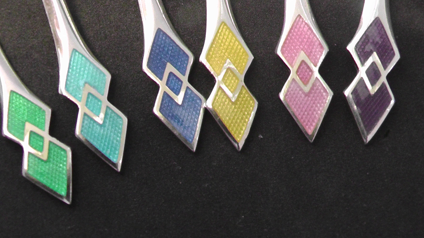 Solid Silver Cased Enamelled Spoons dated 1946