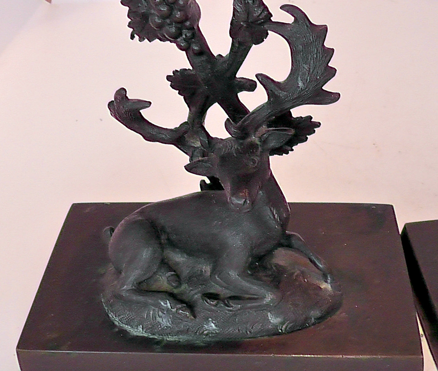 A Pair of Regency Style Stag and Doe Bronze Candlesticks