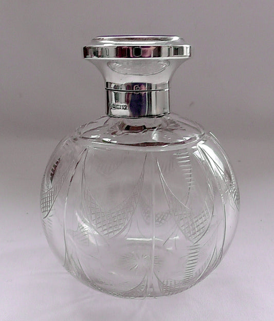 Solid Silver and Enamelled Topped Cut Glass Scent Bottle dates 1920