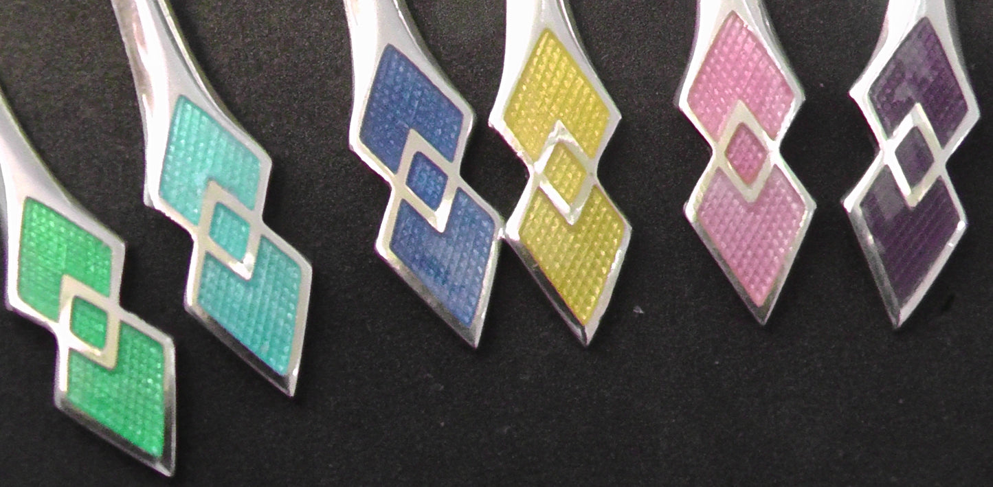 Solid Silver Cased Enamelled Spoons dated 1946