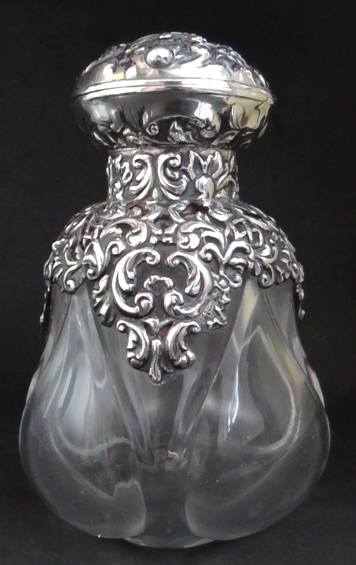 Large Silver Topped and Shouldered Lobed Glass Scent Bottle dates 1902