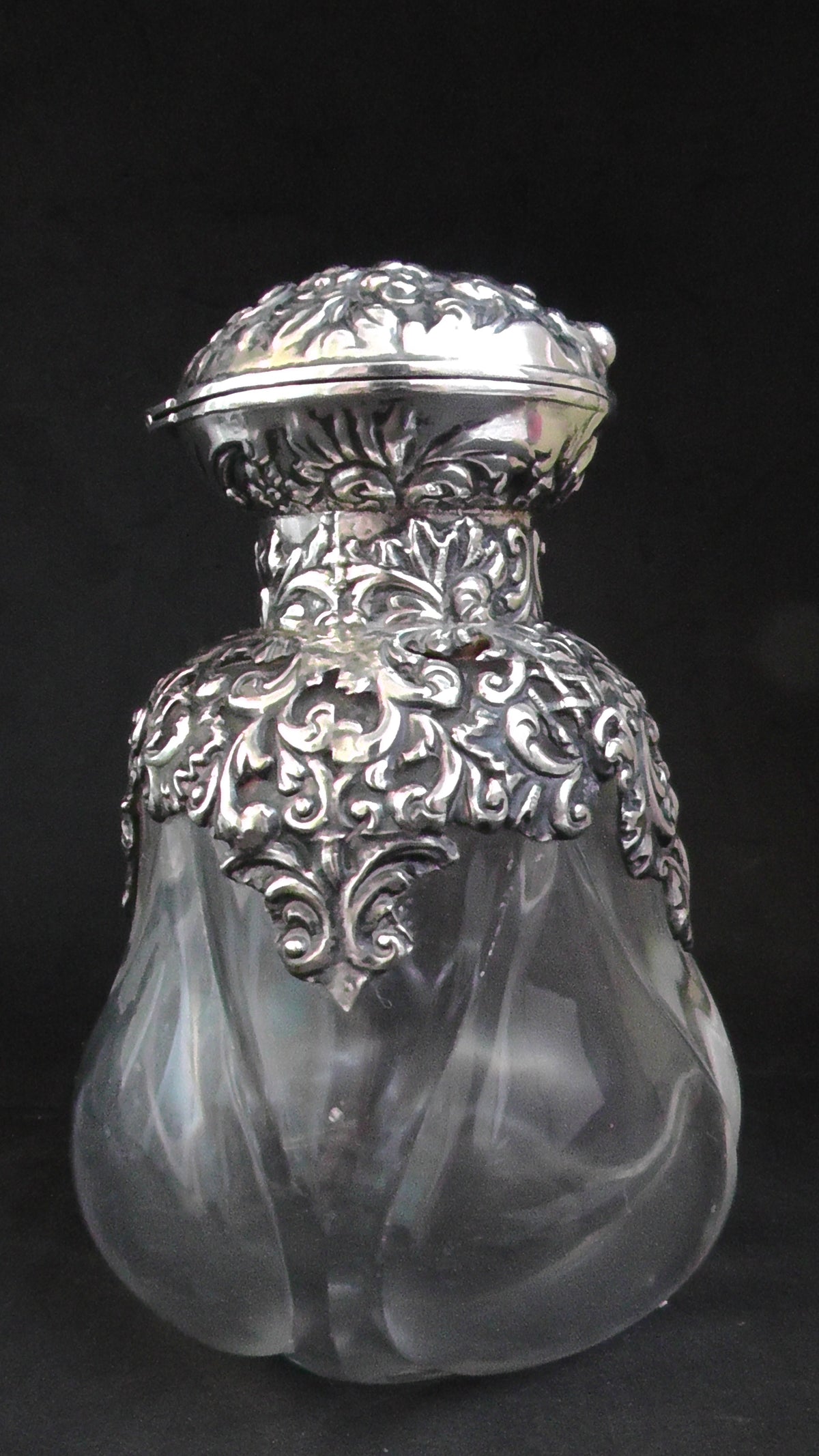 Large Silver Topped and Shouldered Lobed Glass Scent Bottle dates 1902