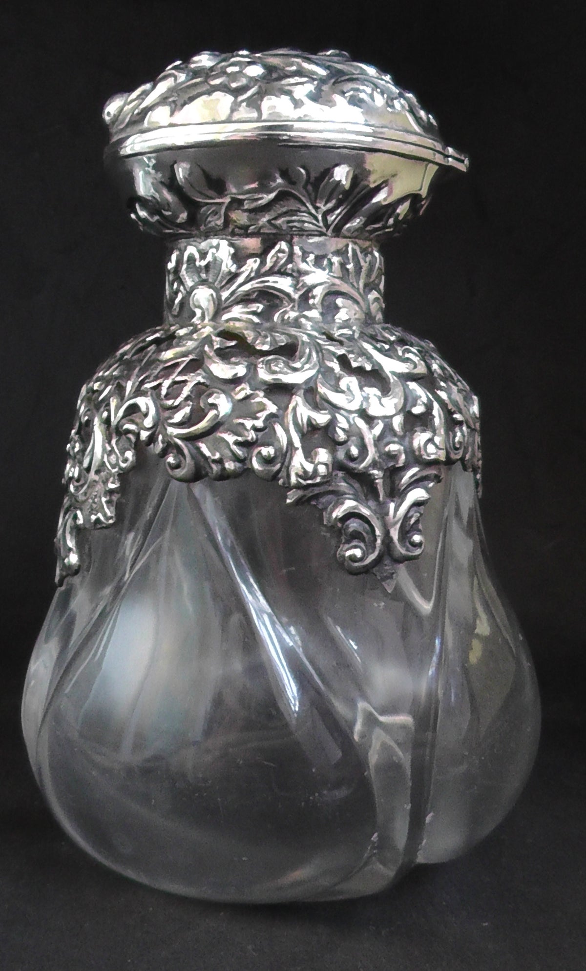 Large Silver Topped and Shouldered Lobed Glass Scent Bottle dates 1902